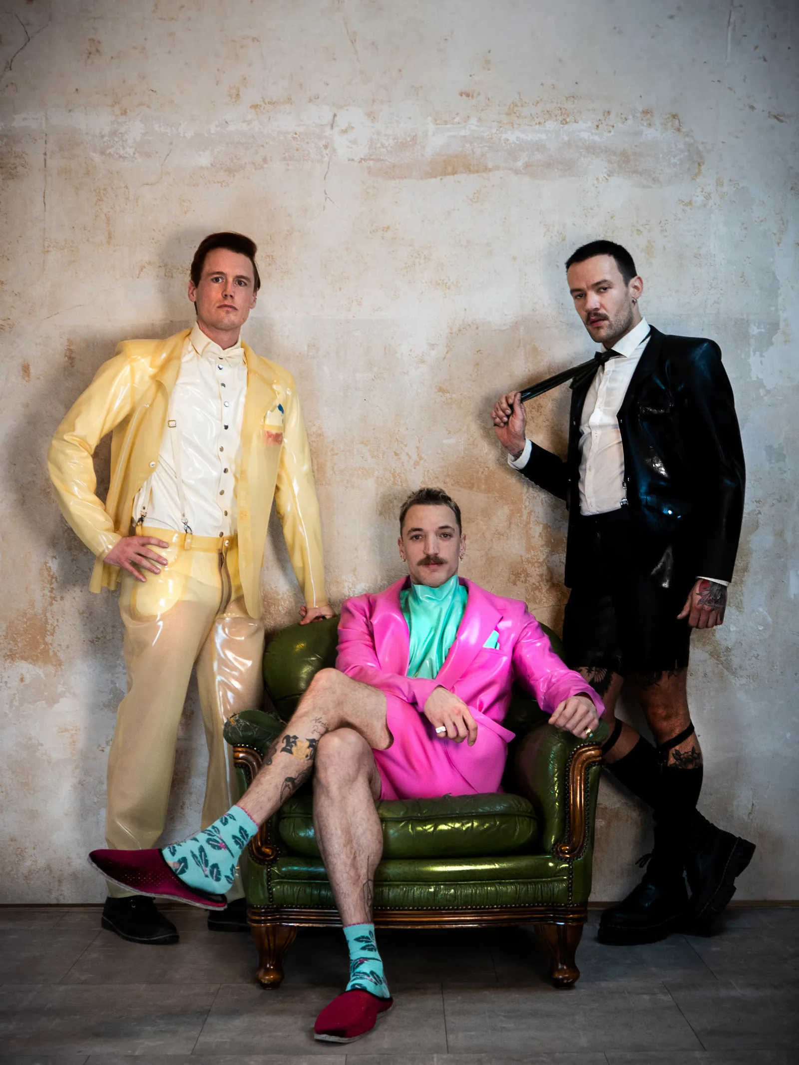 Dress to impress! - all three are wearing individual suits in different designs and colours
